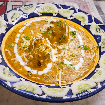 Cheesy veg kofta curry-https://i-media.vyaparify.com/vcards/products/73400/product_1728371769.png Image