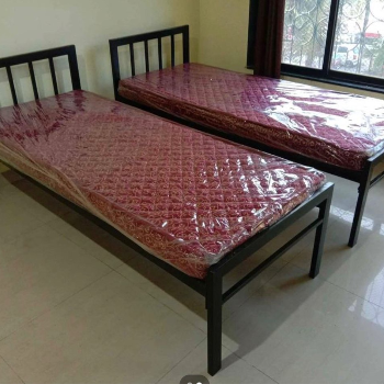 BED WITH MATRESS | NAMOH PG & HOSTEL KARVENAGAR | Namoh PG & Hostel,Lane No 5 & 6 , Parijat Colony, Karve Nagar Pune 411052